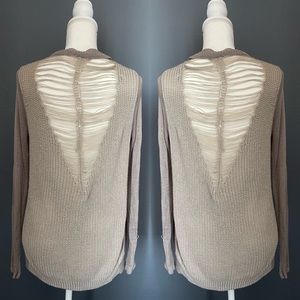Beige brown long sleeve sweater with ripped style in the back size M